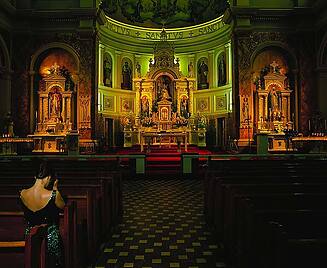 Kneeling in pew at St. Hyacinth's Polish Church